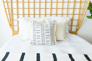 throw pillows on bed