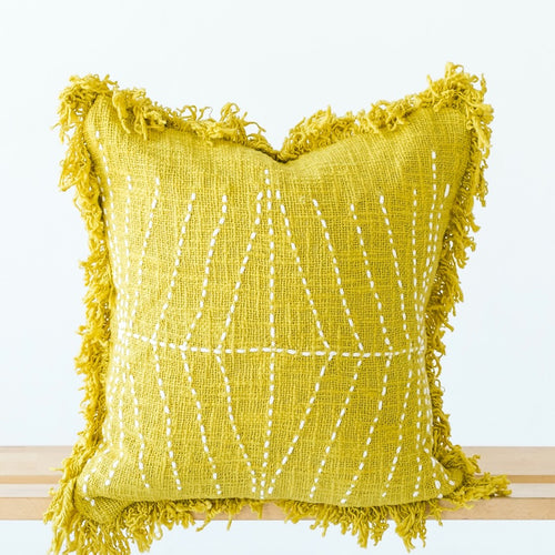 yellow throw pillows with fringe