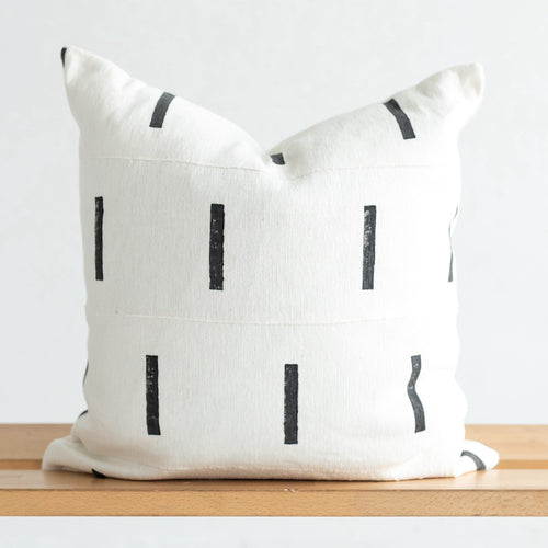 white mud cloth pillow with black print